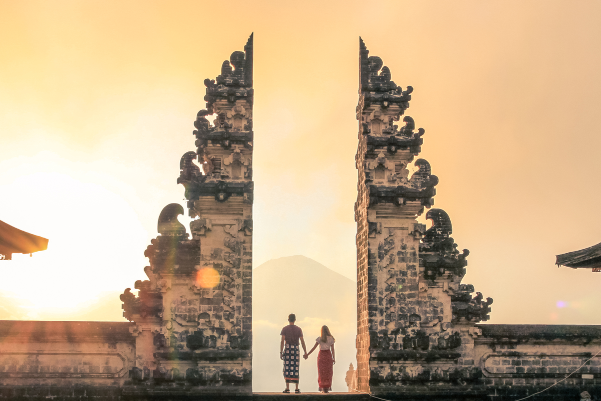 Couple stand at spiritual site in Bali