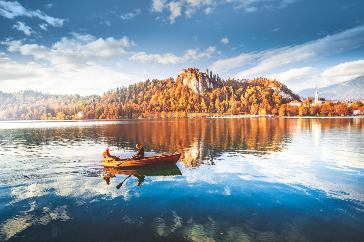 Couple row boat on Lake Bled Slovenia Valentine's Day