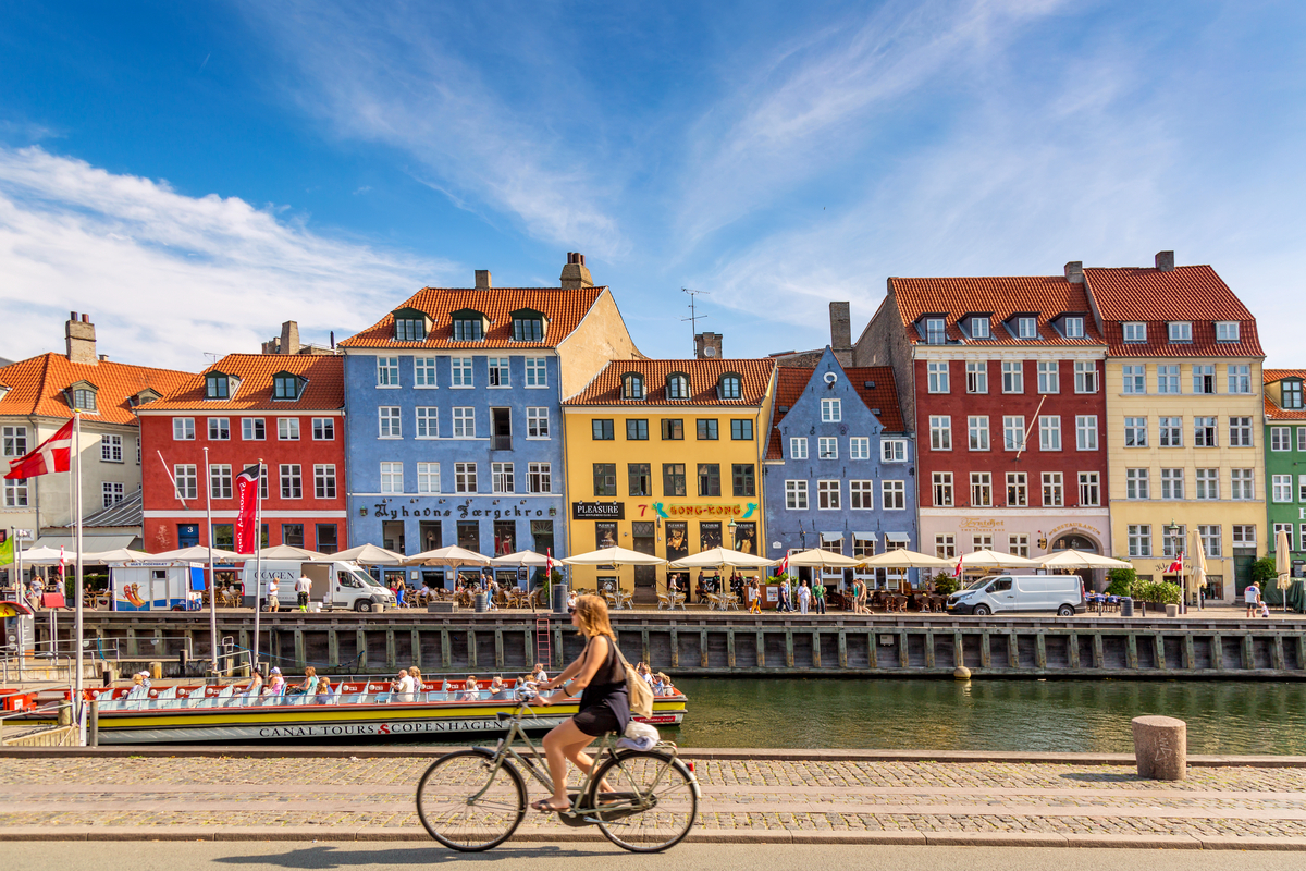 Woman on bicycle Copenhagen Denmark Earth Day