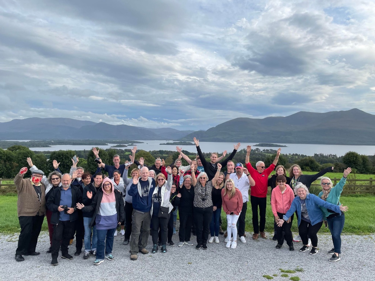 Group of happy Expat Explore travellers on tour in Ireland