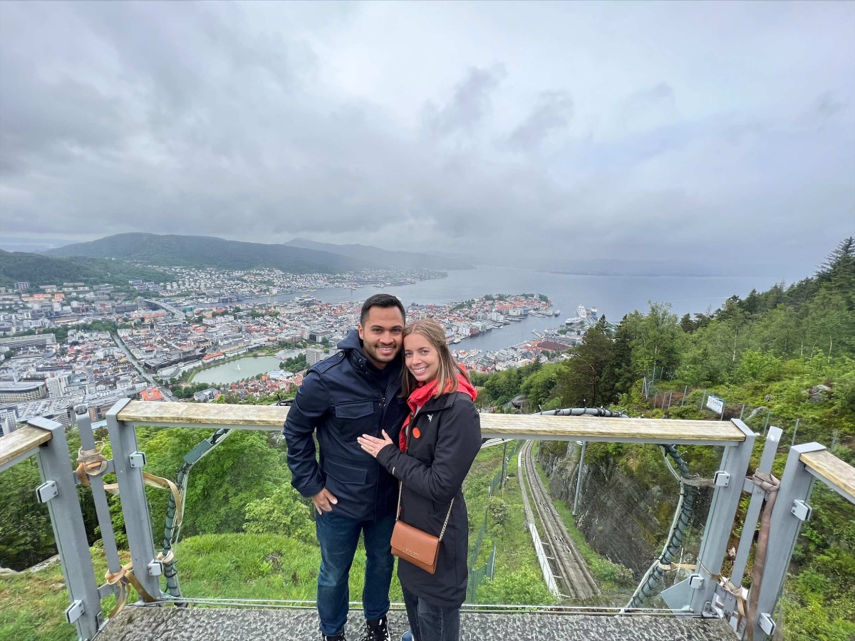 Engaged couple travel through Bergen, Norway